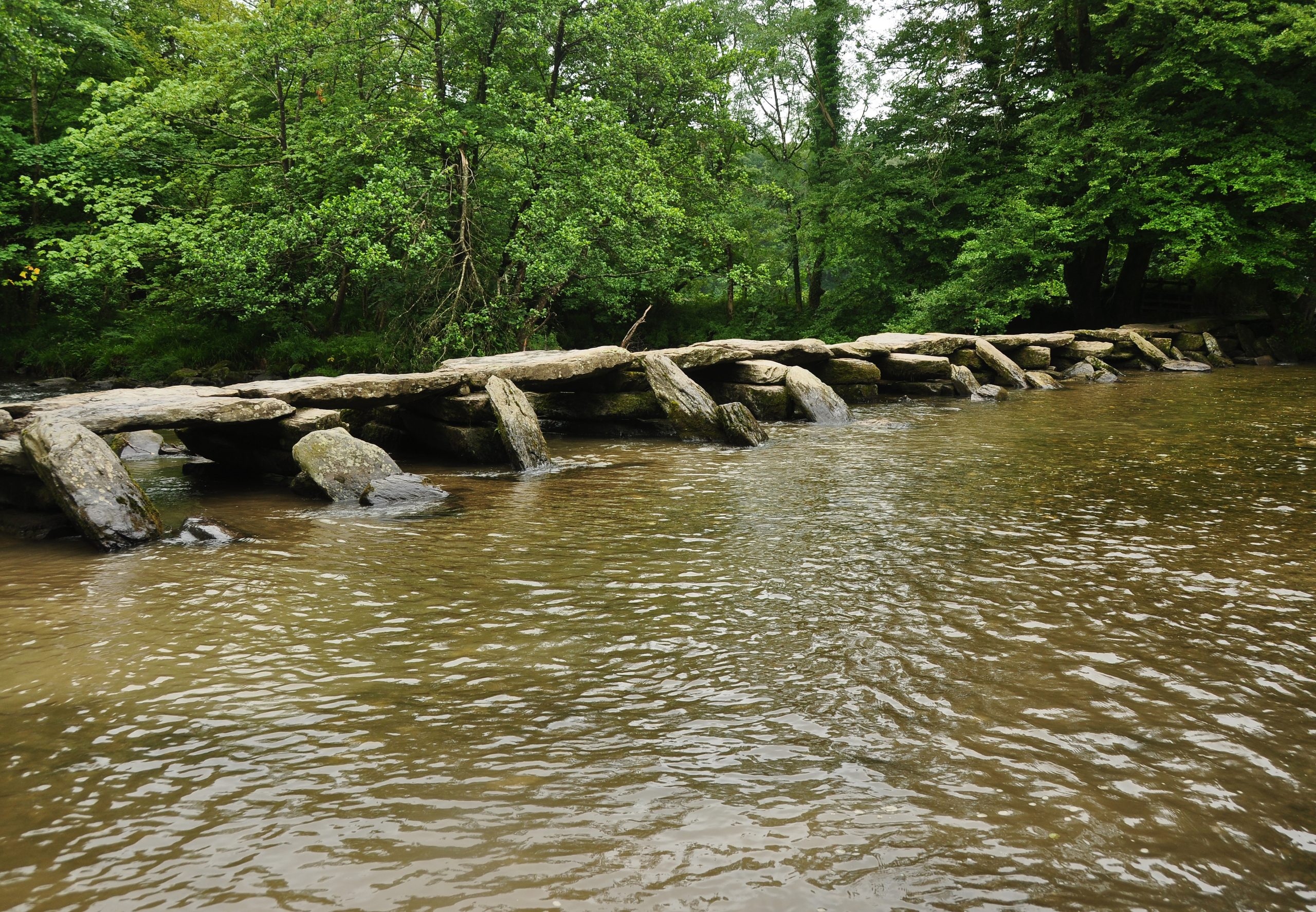 Stone slabs of Tarr Steps crossing the River Barle on Exmoor